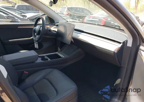 2023 Tesla Model Y Performance Dual Motor All-Wheel Drive z USA, uszkodzony, nr VIN 7SAYGDEF9PF972200